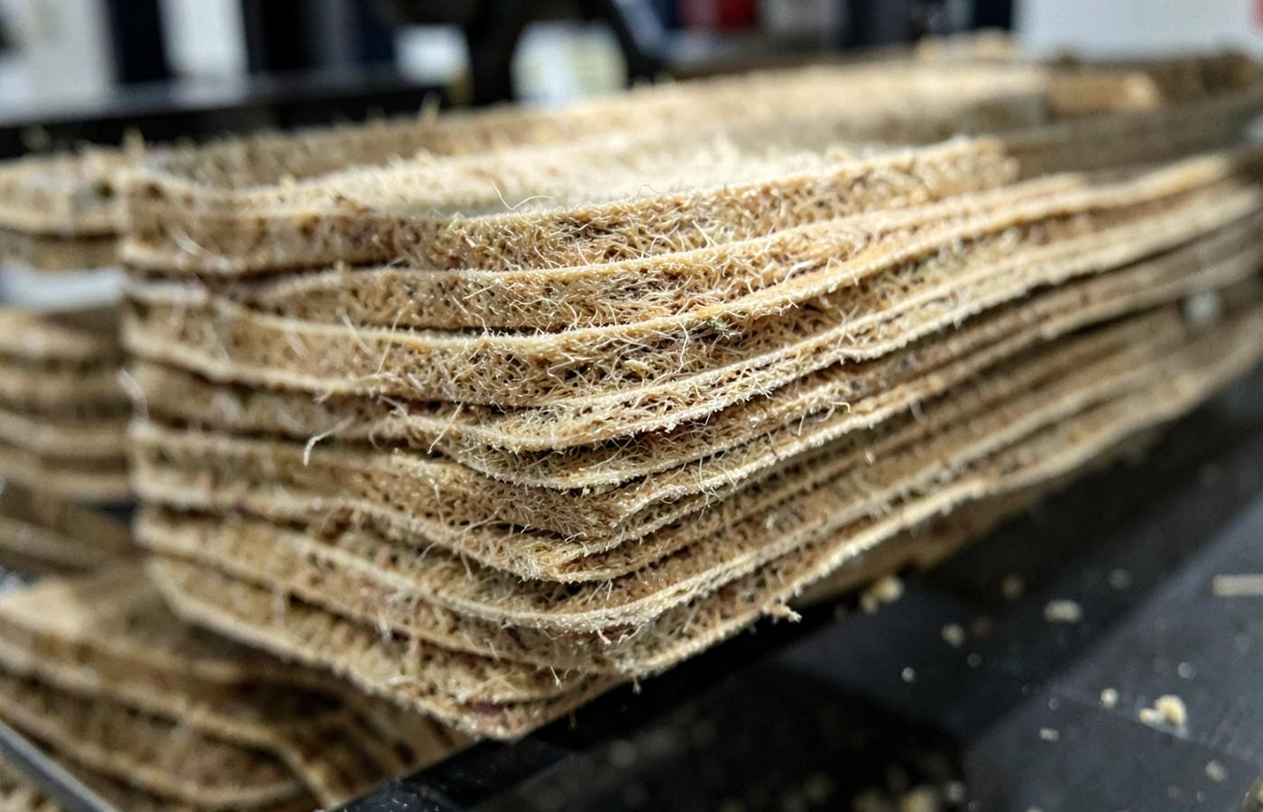 Close-up of stacked extruded hemp-mineral layers
