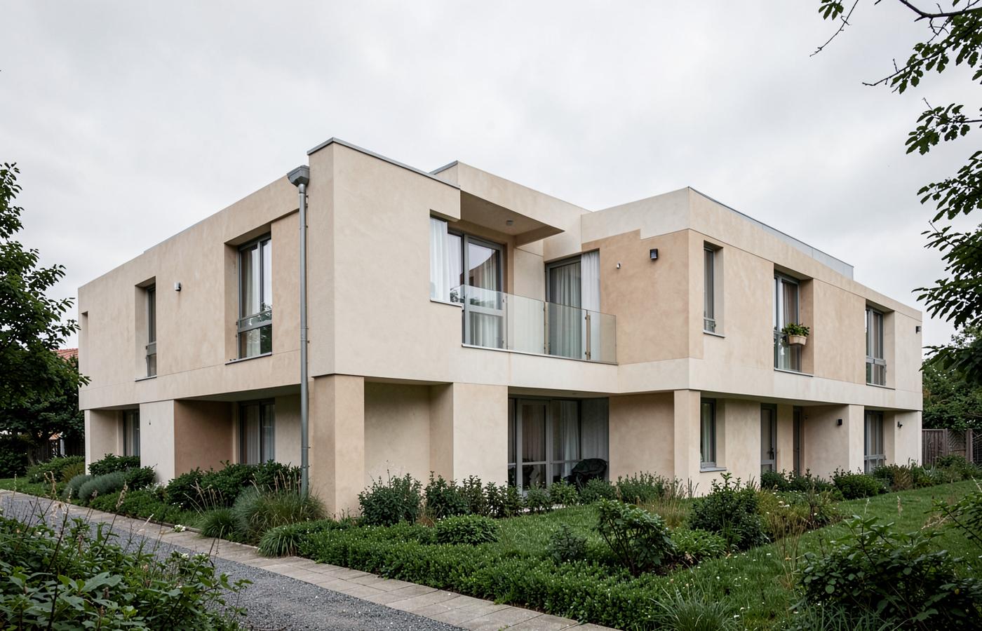 Modern low-rise housing with natural mineral plaster facades